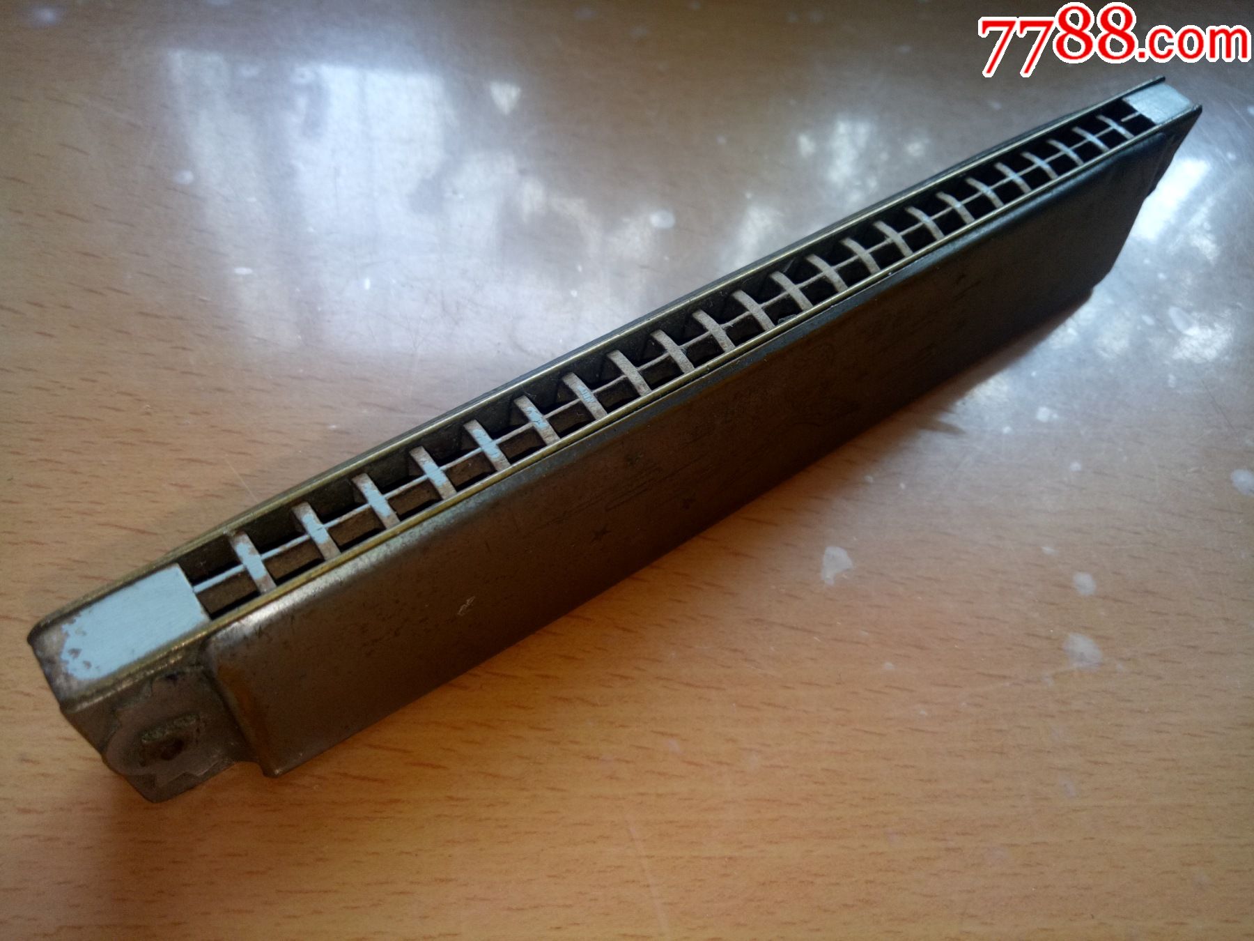石人望口琴.木格.中*口琴厂出品