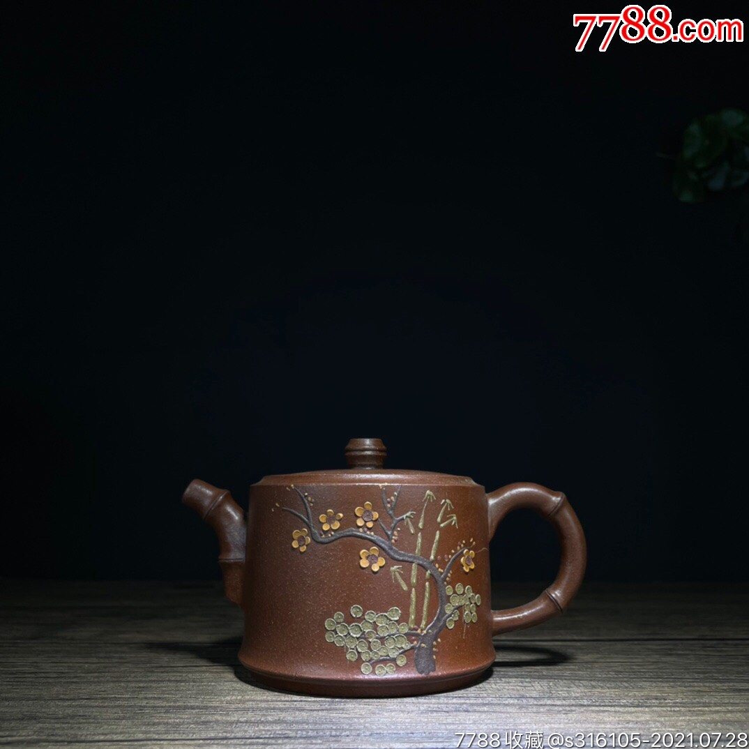 岁寒三友底款:顾清泥料:紫泥孔位:多孔尺寸:(厘米)7×14容量-紫砂壶