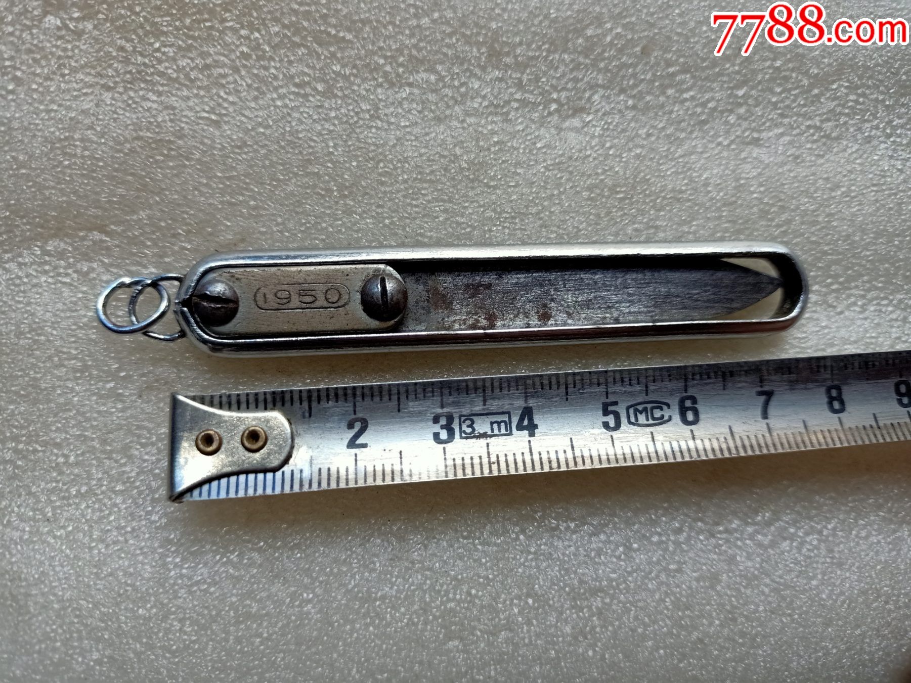 双面1950标小刀d90,推动的,品相如图