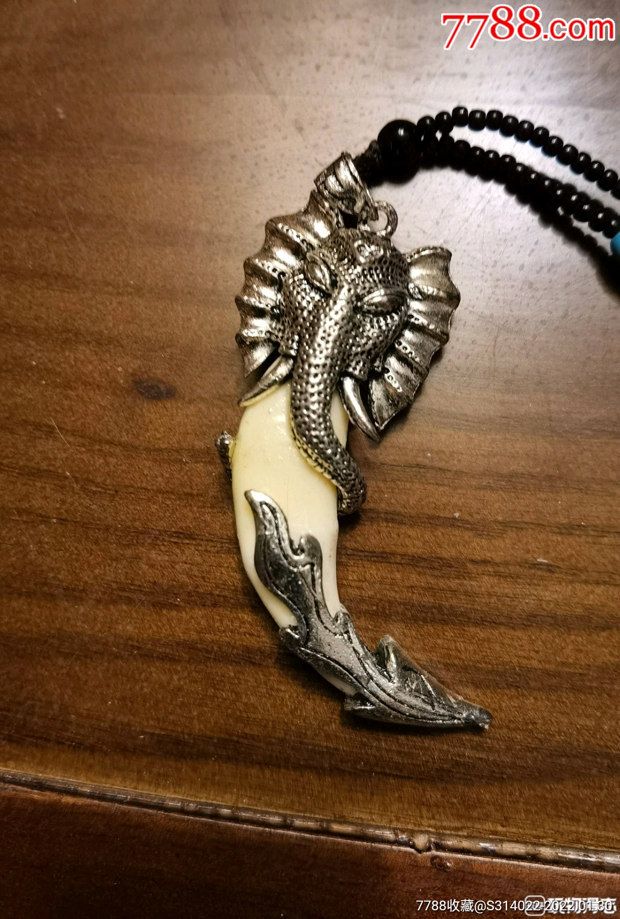 象头财神镶嵌狼牙