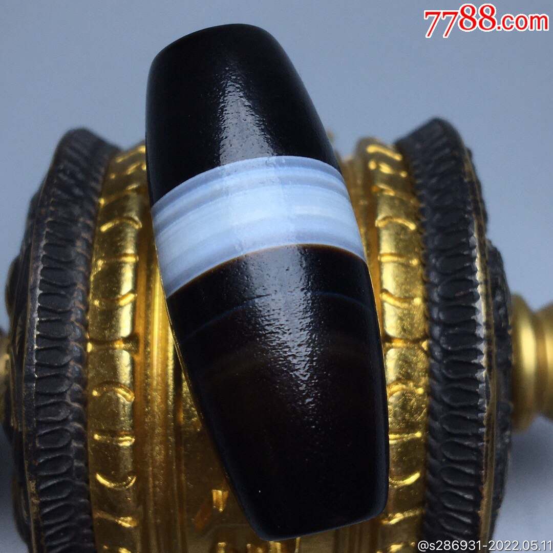 藏区回流老料高油包浆一线天珠尺寸3815毫米重量143克