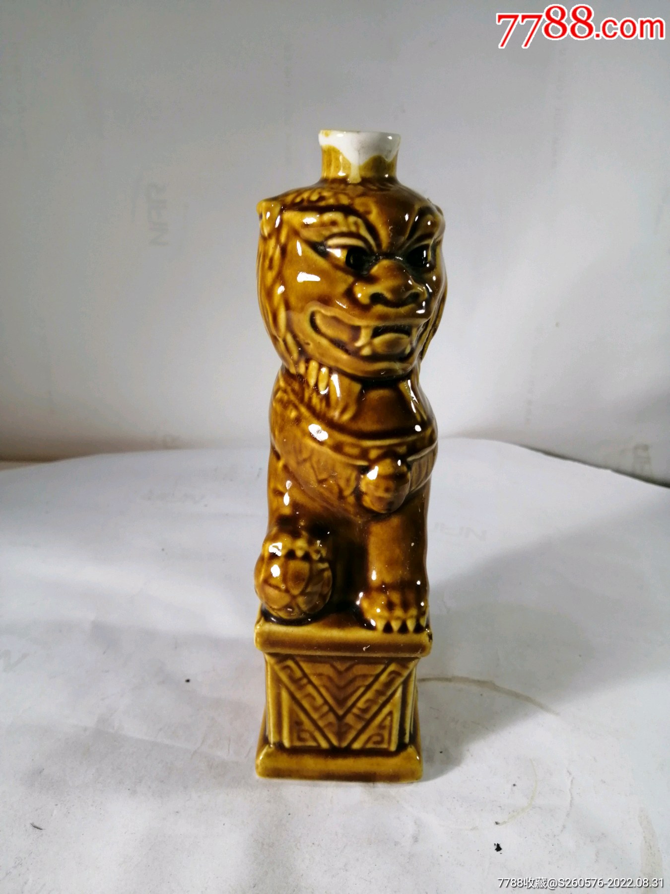 67十年代山西榆社产狮子头酒瓶_酒瓶_图片鉴赏_收藏价值_7788青瓷收藏