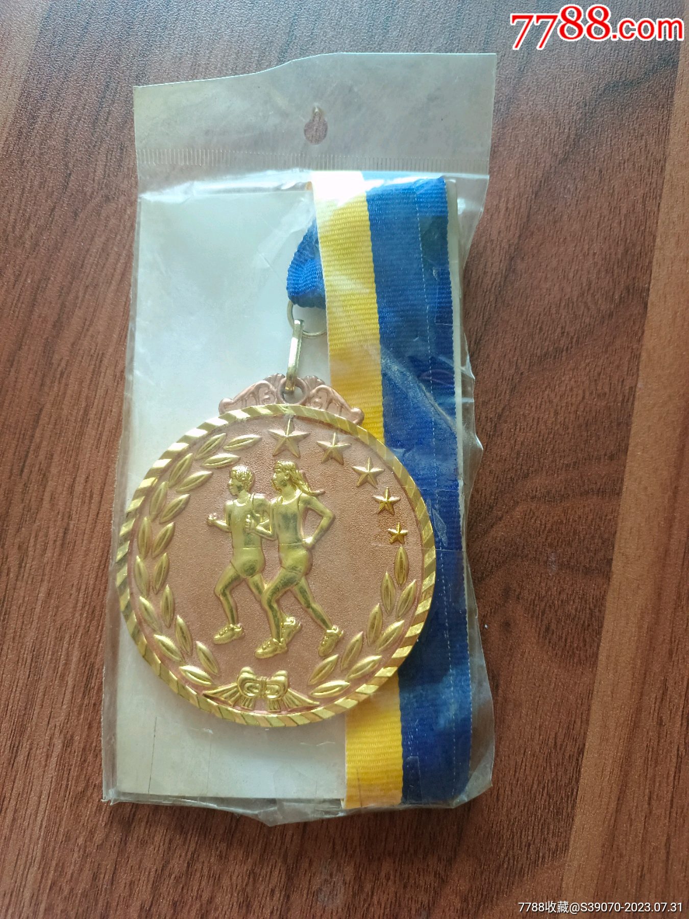 田径图案奖牌一枚,黄色,应该是比赛后,再加注标识_体育运动徽章_东北