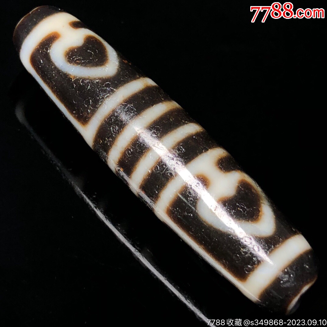 藏区回流老料高油包浆菩提四眼天珠尺寸5713毫米重量136克