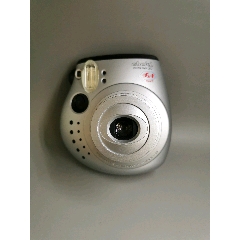 富士拍立得instaxmini20,品相很好如图所示,能通电按键无反应,裸机