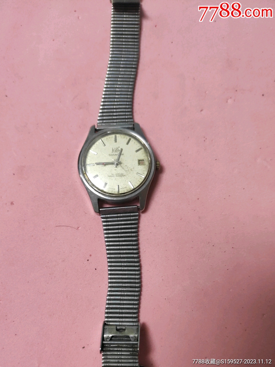 这是一块早期的上海牌手表此表晃晃走时品如图