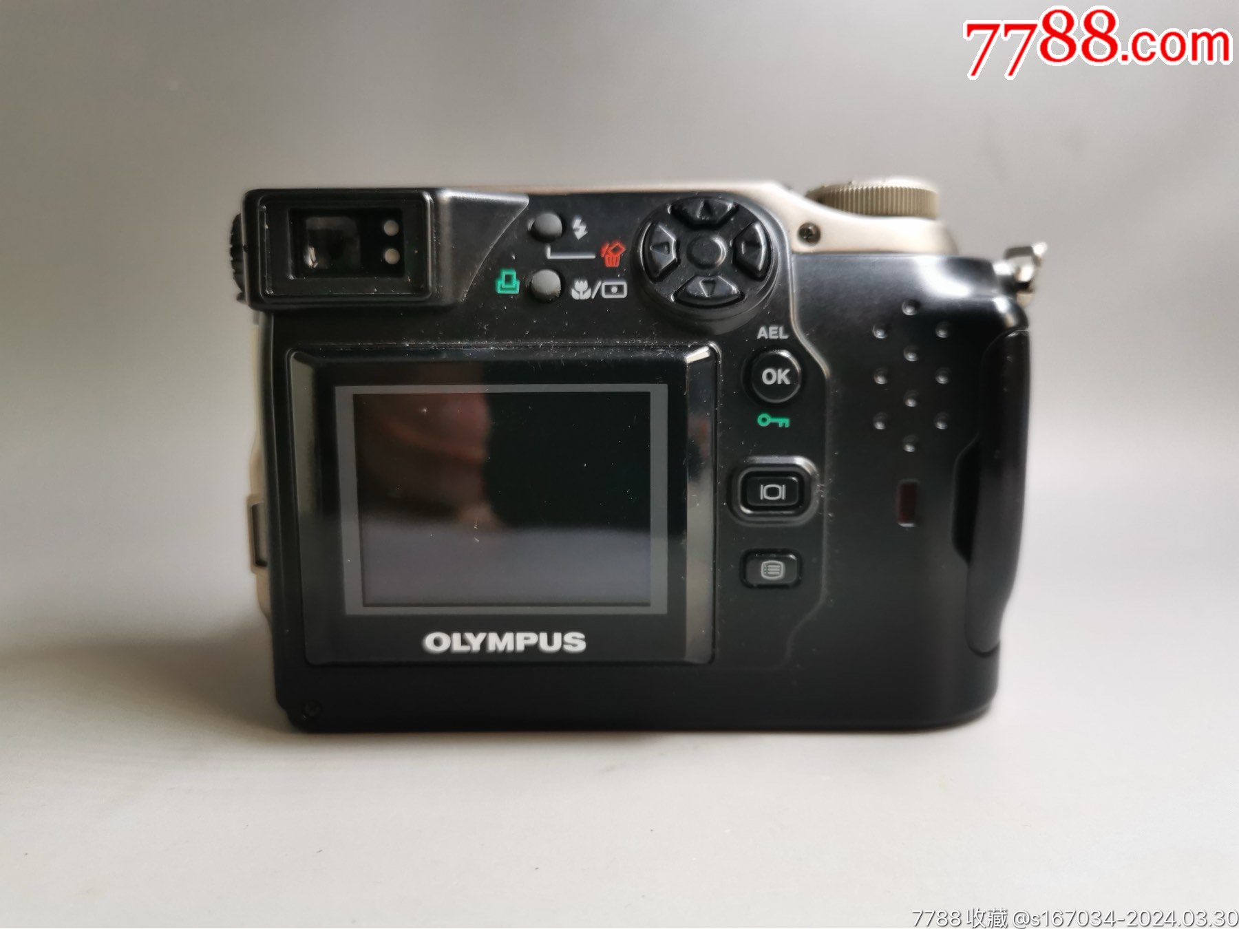 奥林巴斯olympusc2040zoom数码相机品相很好如图所示放入电池