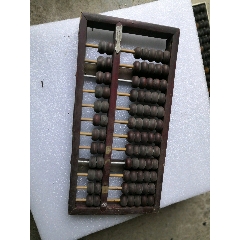 老算盘珠子好像是牛角珠子