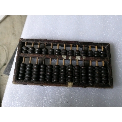 老算盘珠子好像是牛角珠子