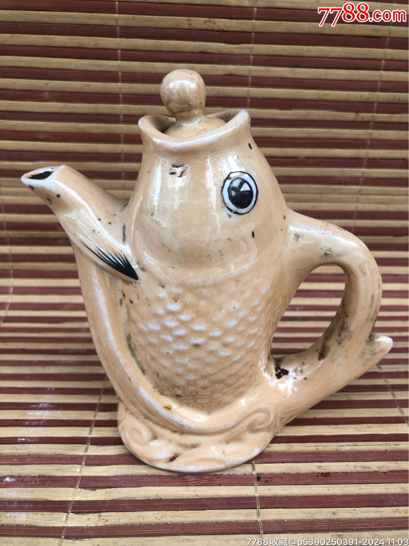 鱼形黄釉壶_黄釉瓷_作品欣赏_收藏价值_7788油画收藏