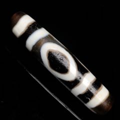 藏區(qū)回流老料高油包漿【三眼天珠】_
