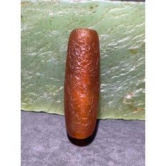 高玉化酒紅色風(fēng)化紋瑪瑙隨形通貨桶珠一顆