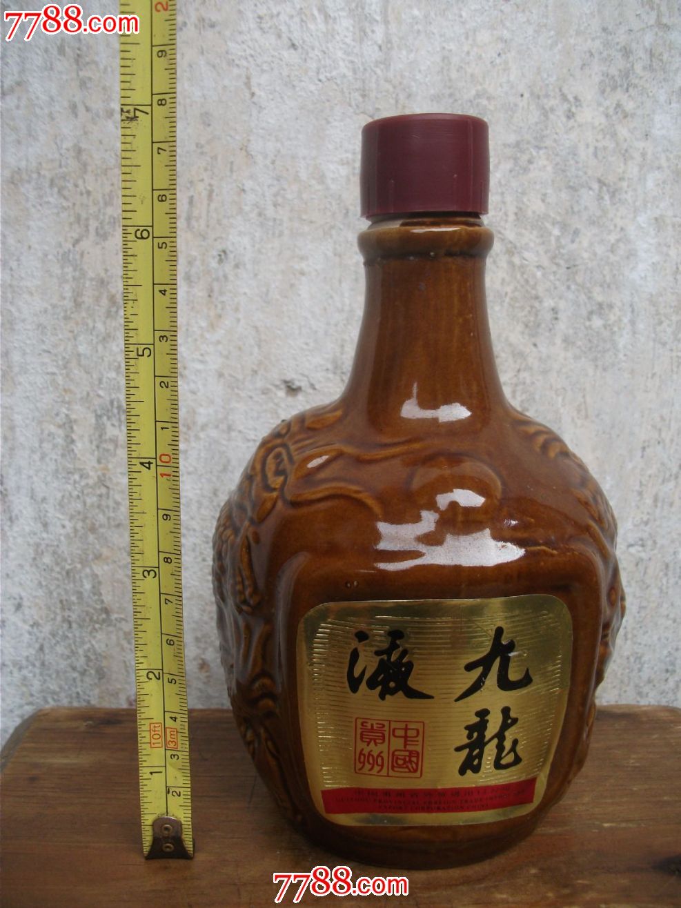 【九龙液】酒瓶一个,品好如图.